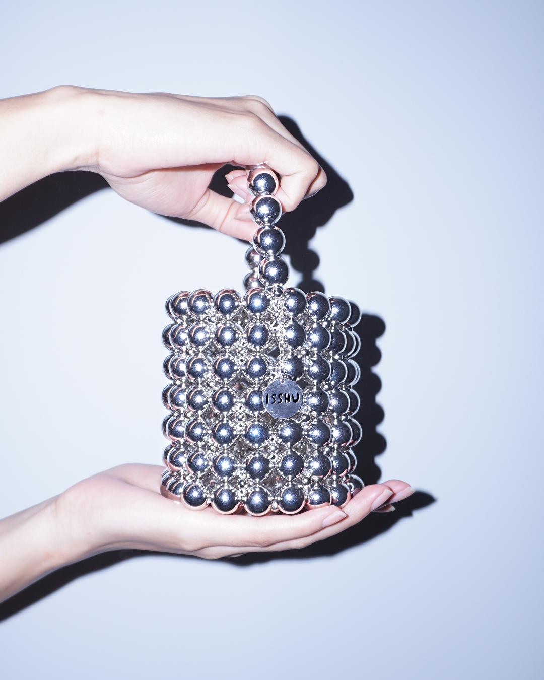 Ball Bag 001 on Hand Model - Side View